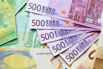 Euro currency banknotes background. European paper money backdrop with 100, 200 and 500 euros bills.